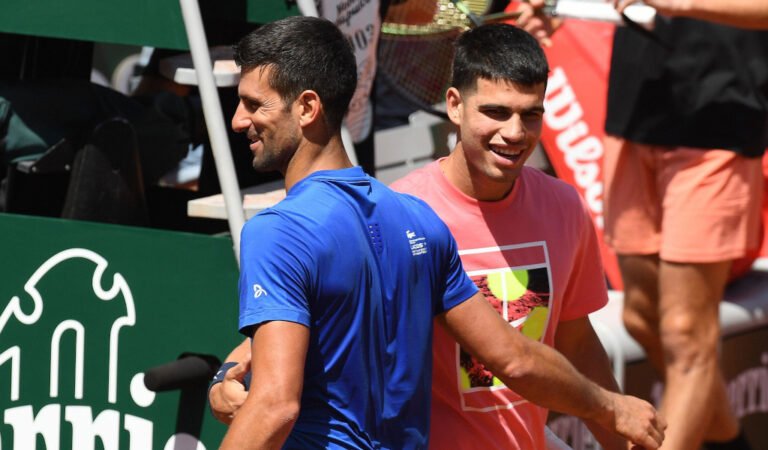Paris, France. 27th May, 2023. Roland Garros Paris French Open 2023 practice day 27/05/2023 Novak Djokovic exchanges pleasantries with No. 1 seed Carlos Alcaraz during practice day on Court Suanne Lenglen. Their next meeting could be in the French Open Se